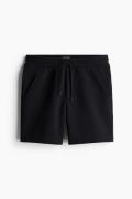 H&M Sweatshorts in Regular Fit Schwarz Größe XS. Farbe: Black