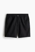 H&M Shorts aus Leinenmix Regular Fit Schwarz in Größe XS. Farbe: Black