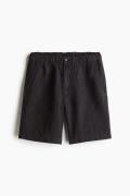 H&M Leinenshorts in Regular Fit Schwarz Größe S. Farbe: Black