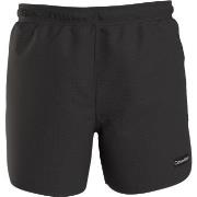 Calvin Klein Badehosen Cool Iconic Texture Swimshorts Schwarz Small He...